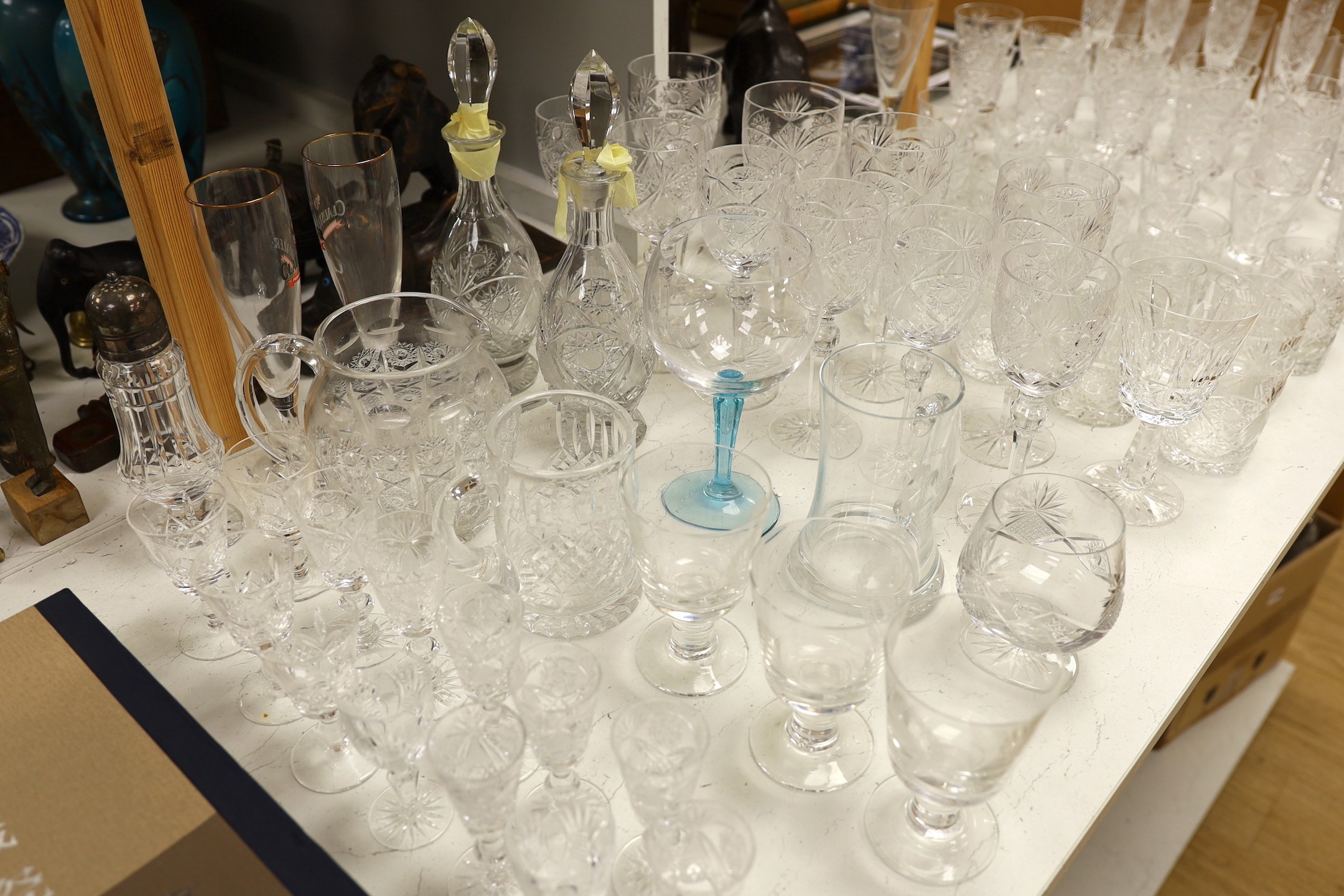 A suite of Hungarian cut drinking glassware, together with other glass